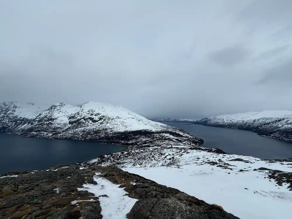 The fjord below the ridge under heavy cloud