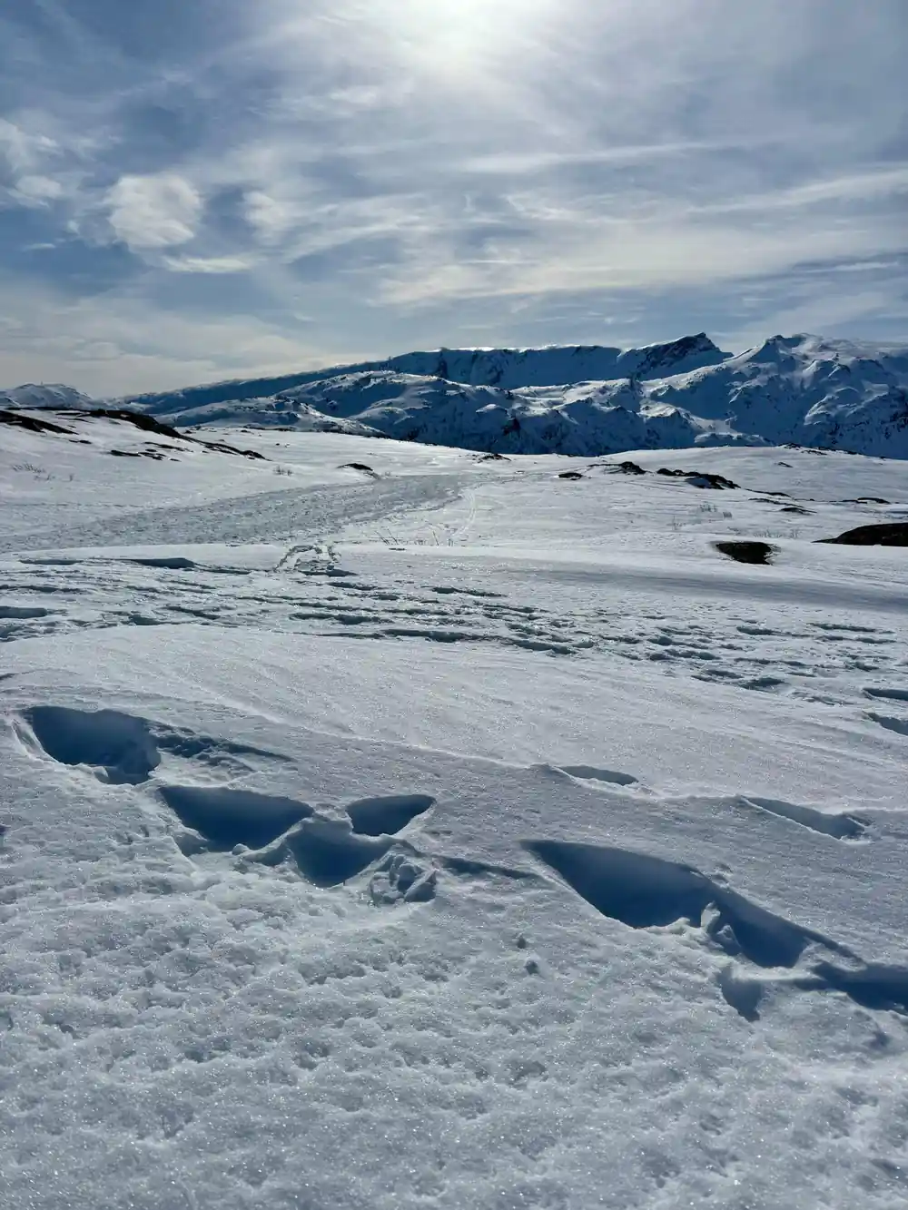 Wind-carved snow across the open plateau